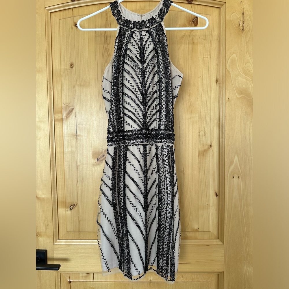 Stunning cream dress with black beading